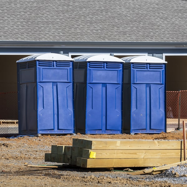 what is the cost difference between standard and deluxe portable restroom rentals in Imlay